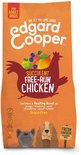 Oranje voerzak van Edgard Cooper met kipafbeelding en twee honden aan de onderkant. Voor volwassen honden, verse kip, graanvrij.