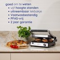 Safecourt contactgrill met brood, tomaten en een plant. De grill heeft uitneembare, vaatwasbestendige, PFAS-vrije platen.