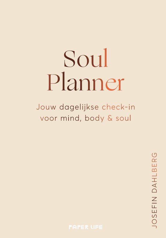 Boek met de titel 'Soul Planner' en 'Jouw dagelijkse check-in voor mind, body & soul'.
