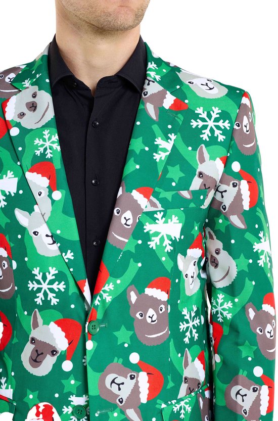 Middelste deel van een groene blazer met kerstprint van lama's en sneeuwvlokken.
