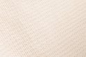 Beige textuur van kleine driehoekjes.
