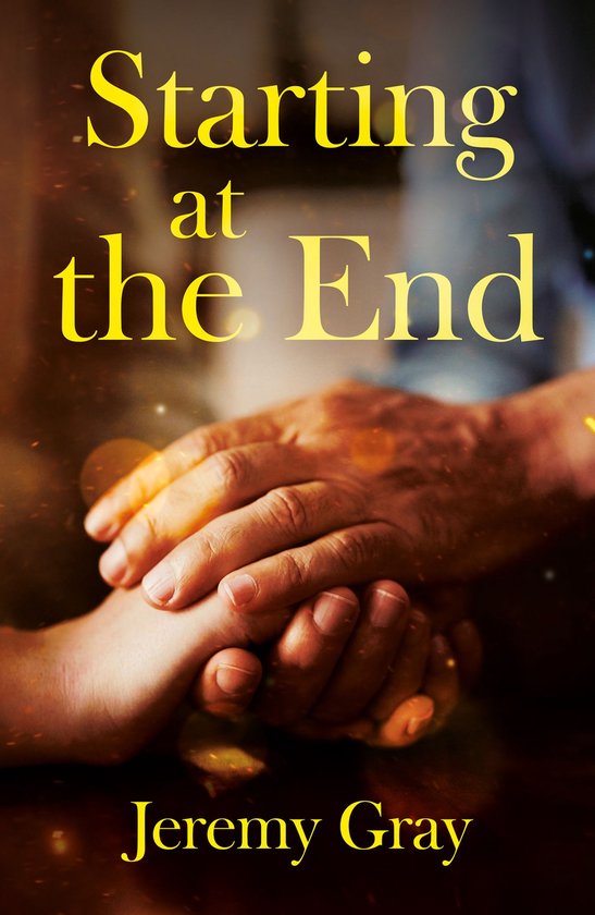 Boekomslag getiteld 'Starting at the End' door Jeremy Gray met twee handen die elkaar teder vasthouden.