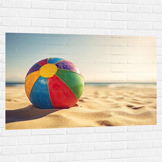 Muursticker - Kleurrijke Strandbal Liggend in het Zand - 120x80 cm Foto op Muursticker