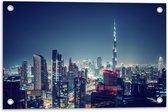 Tuinposter – Dubai in de Nacht met Burj Khalifa - 60x40 cm Foto op Tuinposter (wanddecoratie voor buiten en binnen)