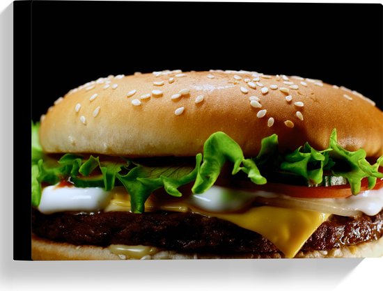 Canvas - Smakelijke Hamburger tegen Zwarte Achtergrond - 40x30 cm Foto op Canvas Schilderij (Wanddecoratie op Canvas)