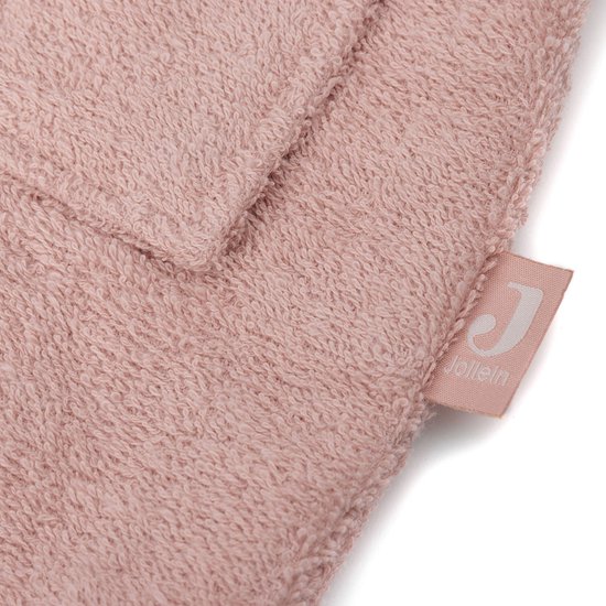 Tissu éponge rose avec étiquette Jollein.