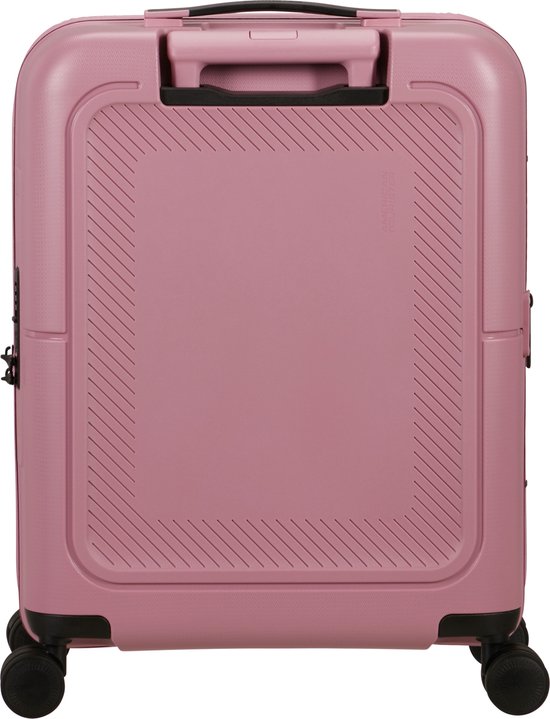Roze American Tourister koffer met reliëfpatroon op de achterkant, handvat en wielen.