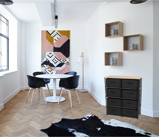 Urban Living rek met 8 zwarte stoffen lades en houten blad, in een moderne woonkamer.