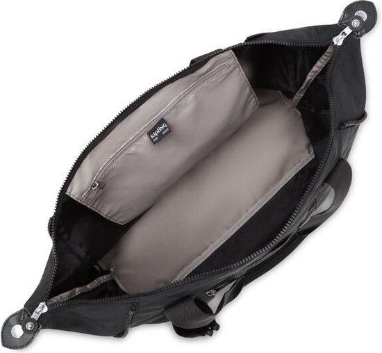 Sac Kipling ART M noir ouvert montrant l'intérieur gris avec des compartiments.