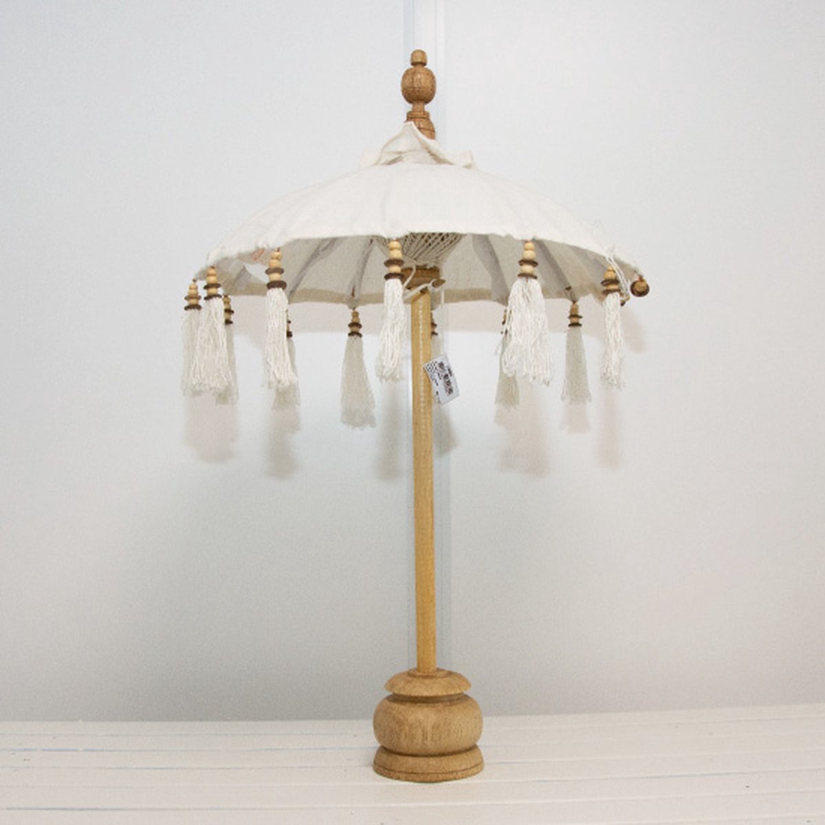 Kleine witte parasol van 50 cm diameter met merk Bali - stijlvolle en praktische zonbescherming voor buiten.