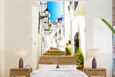 Behang - Fotobehang Traditionele witte gevels straat in Málaga Spanje - Breedte 170 cm x hoogte 260 cm