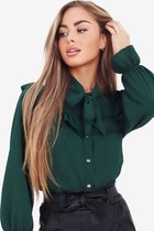 Groene  blouse met kanten ruffle details