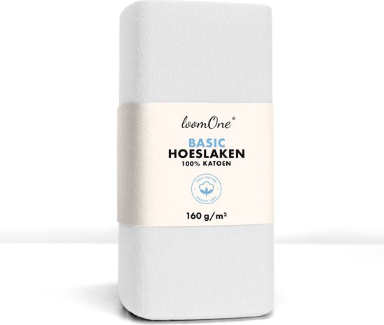 Drap-housse blanc enroulé avec une bande indiquant 'loomOne BASIC HOESLAKEN 100% KATOEN 160 g/m²'.