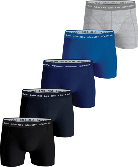 Vijf Björn Borg boxershorts: grijs, kobaltblauw, marineblauw, zwart en donkerblauw.