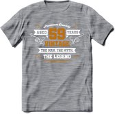 59 Jaar Legend T-Shirt | Goud - Wit | Grappig Verjaardag en Feest Cadeau Shirt | Dames - Heren - Unisex | Tshirt Kleding Kado | - Donker Grijs - Gemaleerd - XL