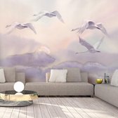 Fotobehang - Flying Swans.