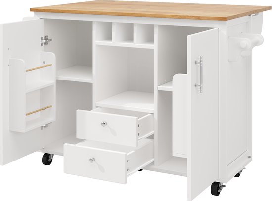 Witte keukenkast met houten blad, open deuren, mand met flessen en laden.