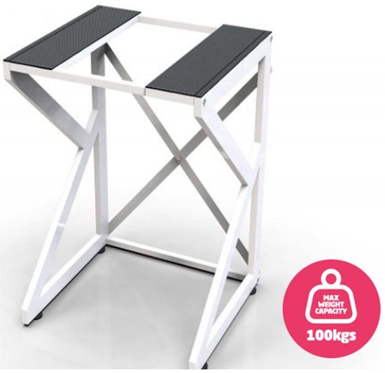 Wit wasmachine-opbouwmeubel met anti-slipmatten en een 'Max Weight Capacity 100kgs' sticker.