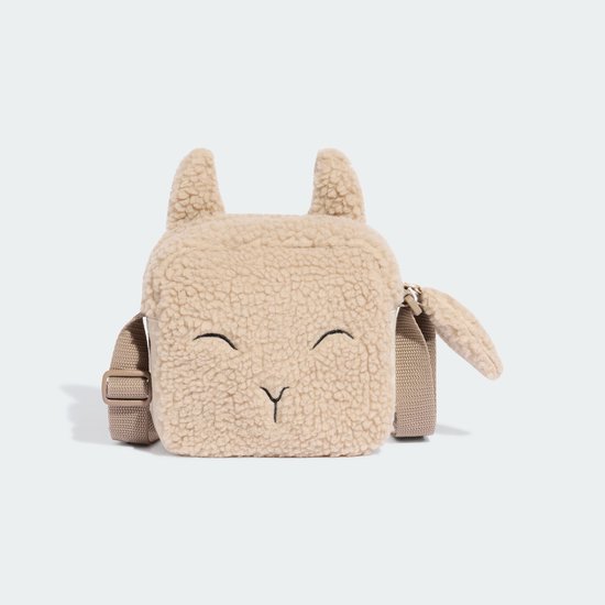 Beige teddy tasje in de vorm van een schaapje, de voorkant is zichtbaar.