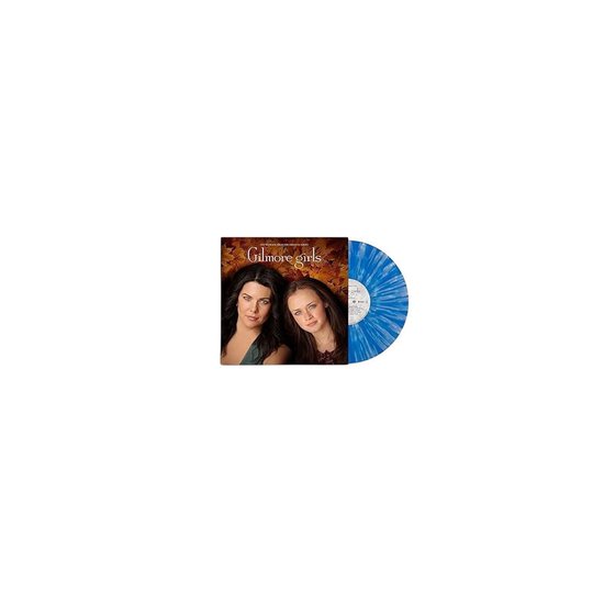 Gilmore Girls soundtrack vinyl met een blauwe, gespikkelde plaat naast de albumhoes met Lorelai en Rory onder herfstbladeren.