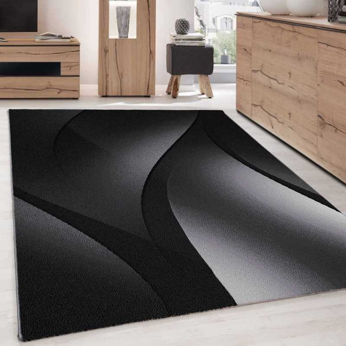 Modern abstract vloerkleed met optisch golfpatroon, zwart en grijs 160x230 cm