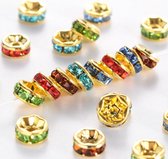 Rhinestone spacer beads, goud met multi kleur chatons, 5x2,5mm. Verkocht per 100 stuks !!