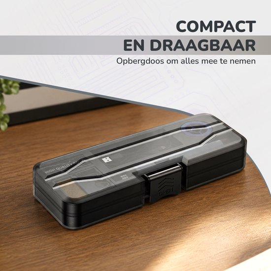 Grijze, compacte en draagbare soldeerbout in een transparante opbergdoos.