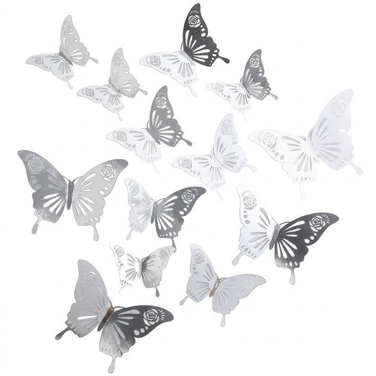 Une collection de papillons 3D argentés et gris foncé avec des motifs, disposés sur un fond blanc.