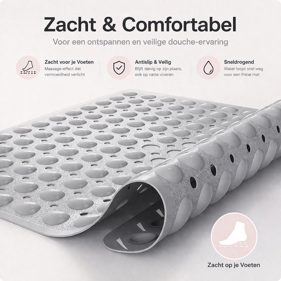 Grijze antislip douchemat met noppenstructuur, waarop een voet staat. Zacht voor de voeten.