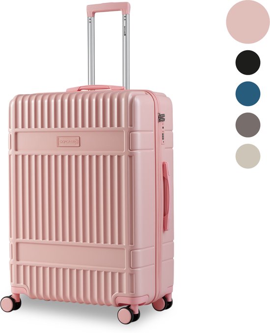 Lichtroze koffer met ribbelpatroon, naast cirkels in roze, zwart, blauw, grijs en beige.