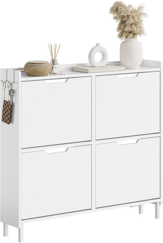 Witte schoenenkast met 4 lades, sleutelhangers aan de zijkant, en decoratie bovenop.