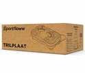 Verpakking van een zwarte trilplaat met banden, merk Sportfloww, tekst 'TRILPLAAT' en specificaties.