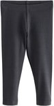 Donkergrijze geribbelde legging.