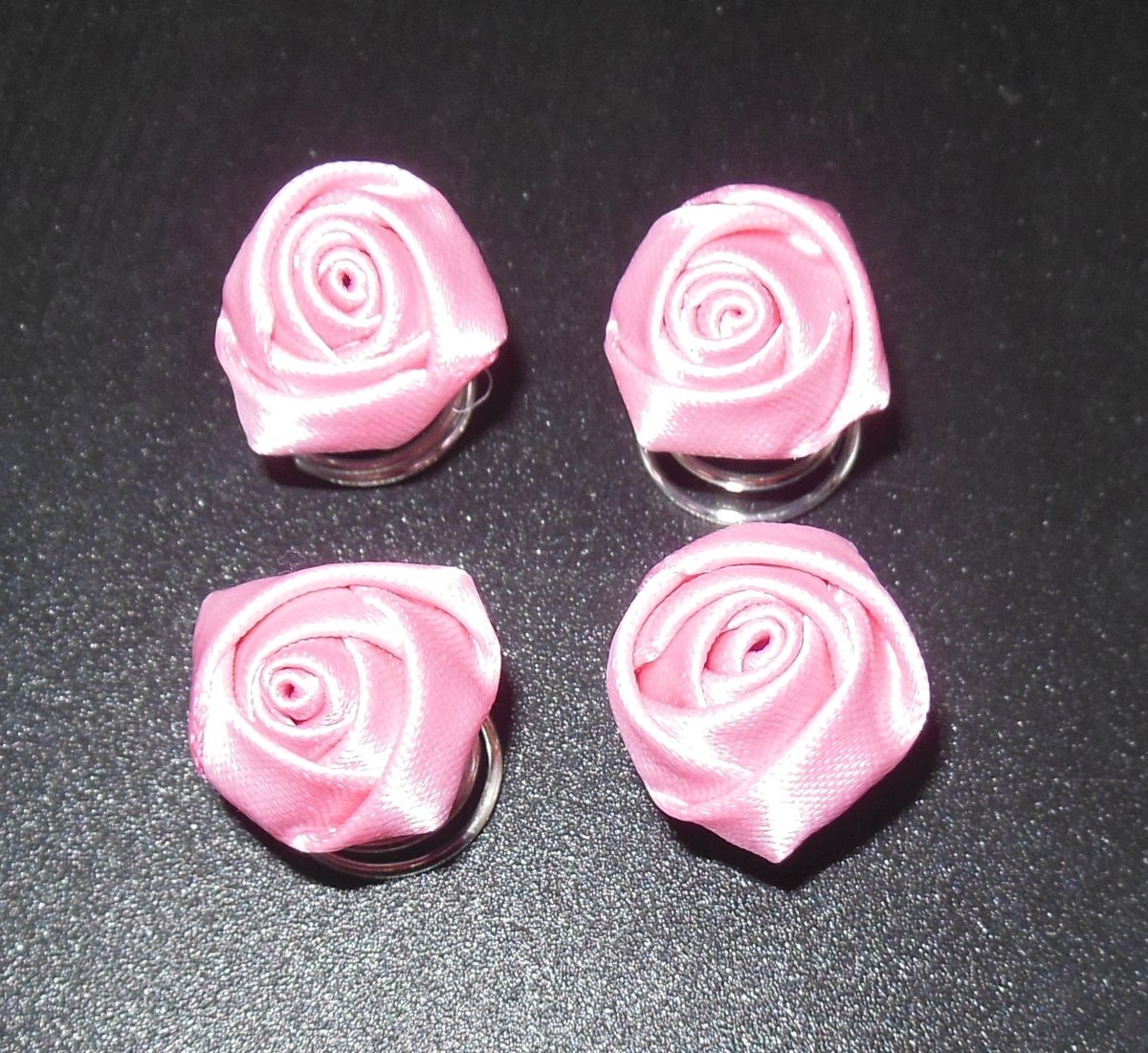 Curlies met roosje roze