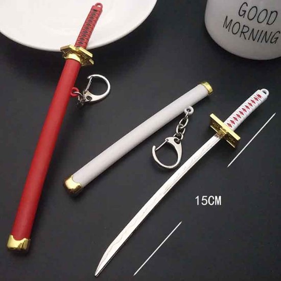 Miniatuur rood zwaard met schede en sleutelhanger, naast een wit zwaard en schede, 15cm.