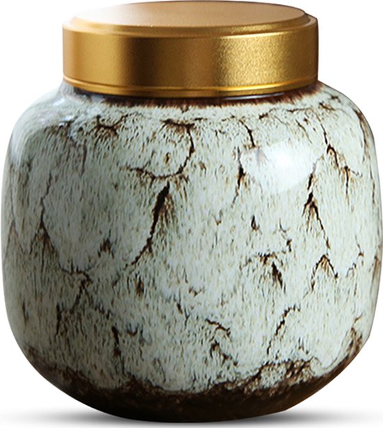 Keramische urn met craquelé-patroon in crème en bruin, met glanzende gouden deksel.