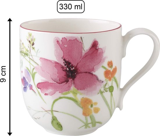 Witte mok van 330 ml met een roze bloemenprint en rode rand. Hoogte 9 cm.