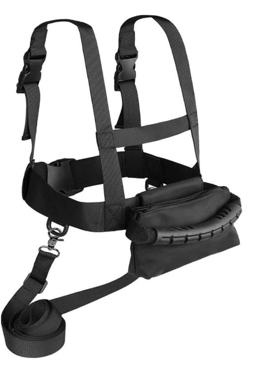 Zwart skiharnas van nylon met verstelbare banden, een gesp, een riem en een tasje met handvat.