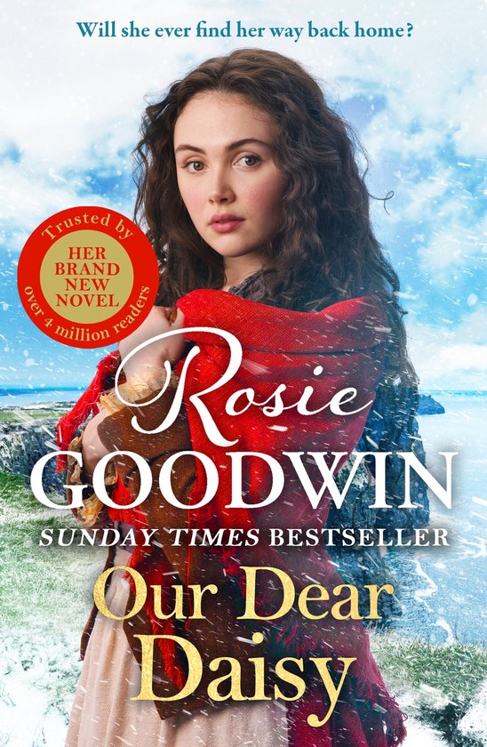 Een jonge vrouw met bruin haar, die een gebreide rode sjaal draagt, staat voor een besneeuwd landschap aan de kust. 'Rosie Goodwin - Our Dear Daisy'