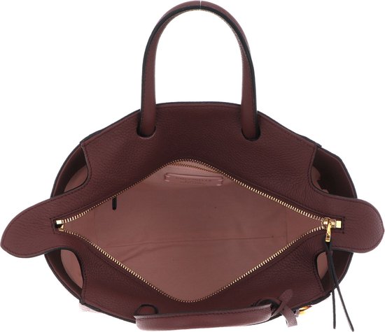 Sac à main ouvert en cuir marron avec fermeture éclair dorée et intérieur rose pâle.