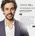 Kérastase Global Professional Ambassador Hovig Etonyan, lachend in een grijs pak.