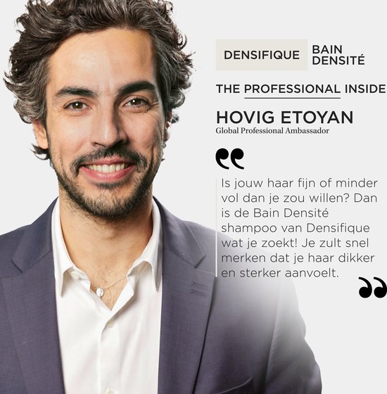 Kérastase Global Professional Ambassador Hovig Etonyan, lachend in een grijs pak.