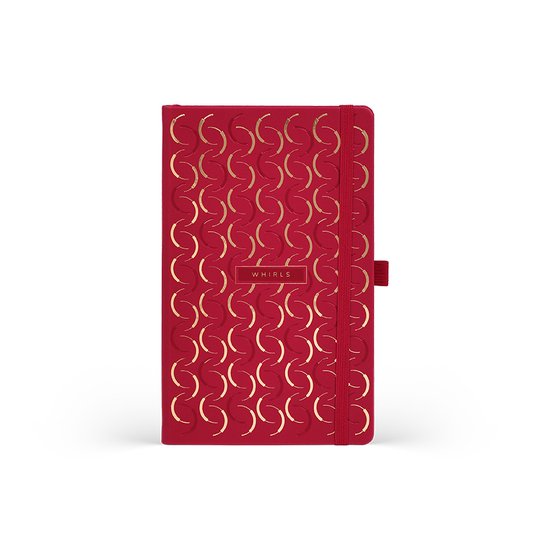 Carnet A5 rouge avec un motif doré 'whirls'. Avec bande élastique et étiquette 'CASTELLI MILANO'.