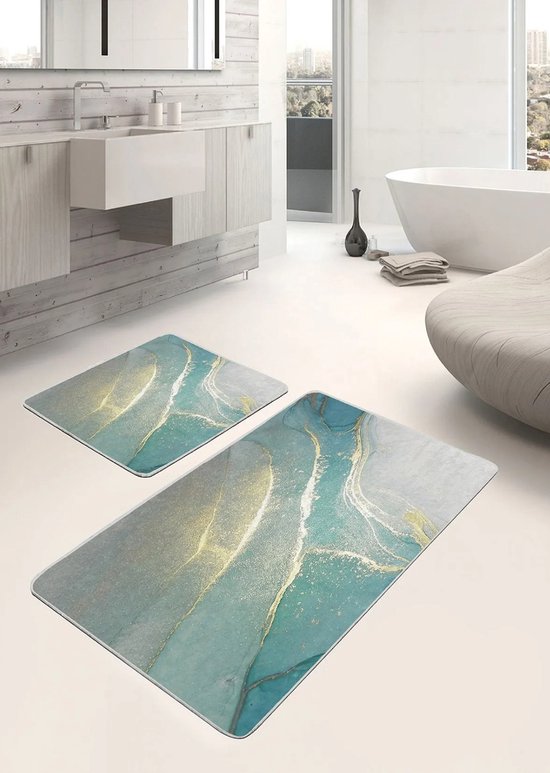 Twee badmatten met marmerlook, groen met gouden accenten, in een badkamer.