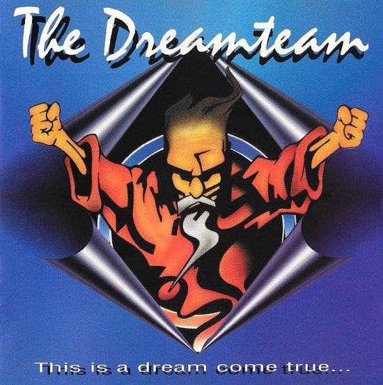 Een tekenfilmfiguur met een oranje outfit, baard en vuisten, door een metalen frame heen. De tekst 'The Dreamteam' staat bovenaan.