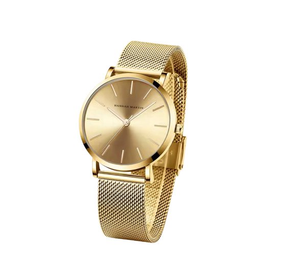 Montre Hannah Martin dorée avec bracelet en maille et cadran minimaliste.