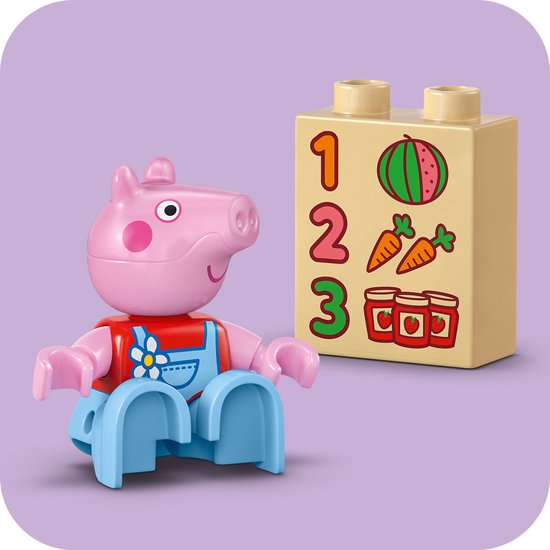 LEGO Duplo Peppa Pig Peppa met blok met cijfers, watermeloen, wortels en jam.