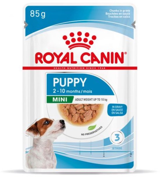Zakje Royal Canin Puppy Mini natvoer, 85 g, met een puppy die omhoog kijkt.