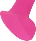 Close-up van de afgeronde, roze kop van een vibrator.