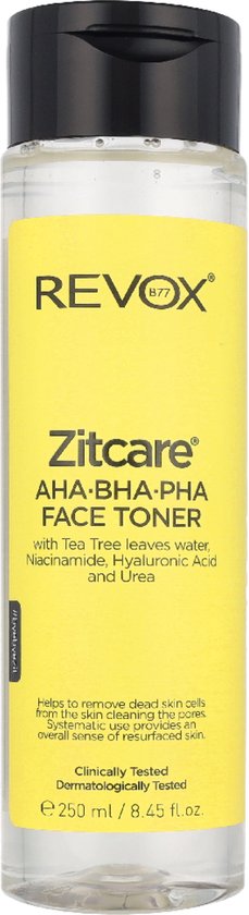 Gele REVOX Zitcare AHA BHA PHA Face Toner fles met zwarte dop. Bevat Tea Tree, Niacinamide, Hyaluronzuur en Urea. 250 ml.